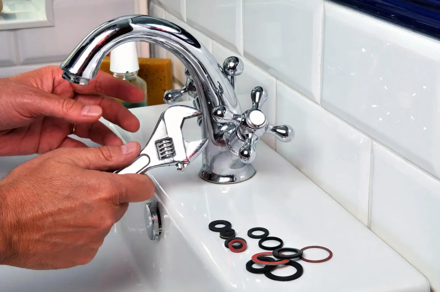Plumber maintaining a bathroom faucet in Glendora
